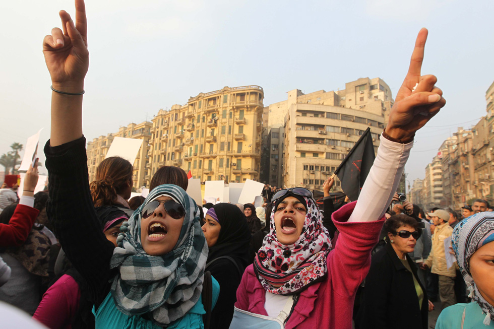 Egyptian women shout slogans during a protest in downtown Cairo to denounce the military's attacks on women and to call for an immediate end to the violence against protesters on December 20, 2011. AFP PHOTO/KHALED DESOUKI (Photo credit should read KHALED DESOUKI/AFP/Getty Images)