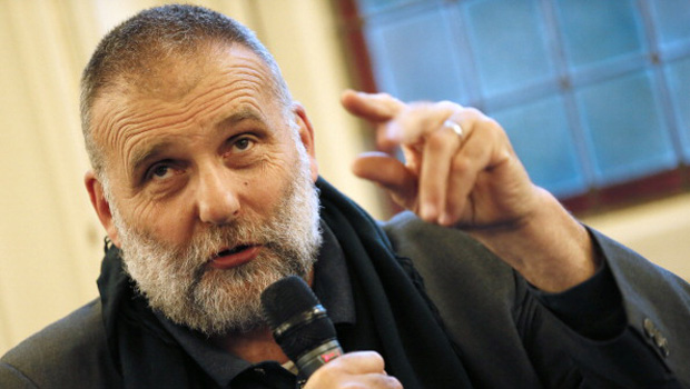 Italian priest Paolo Dall?Oglio, expelled from Syria by Bashar al-Assad?s government in June takes part in a conference on the theme "Syrian christians" , on September 25, 2012 in Paris. After 30 years of running a monastery near Damascus, Dall?Oglio has reinvented himself since his departure as an unofficial diplomat for Assad's opponents, trying to create a united opposition. AFP PHOTO KENZO TRIBOUILLARD        (Photo credit should read KENZO TRIBOUILLARD/AFP/GettyImages)