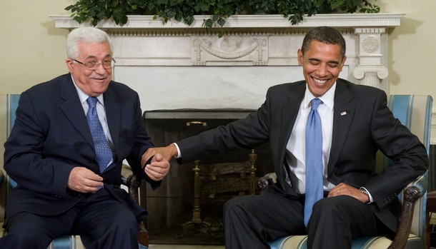 US President Barack Obama and Palestinian President Mahmoud Abbas (L) share a light moment during meetings in the Oval Office of the White House in Washington, DC, May 28, 2009.  AFP PHOTO / Saul LOEB (Photo credit should read SAUL LOEB/AFP/Getty Images)