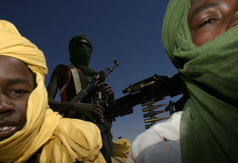 SLA (Sudanese Liberation Army) rebels in Tabit town, south from El Fasher, during a meeting with the African Union cease-fire comission to hand over a thief arrested by SLA.