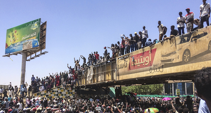 Protesters rally in front of the military headquarters in the capital Khartoum, Sudan, Monday, April 8, 2019. Organizers behind anti-government demonstrations in Sudan said security forces attempted to break up a sit-in outside the military headquarters. A spokeswoman for the Sudanese Professionals Association told The Associated Press that clashes erupted early Monday between security forces and protesters, who have been camped out in front of the complex in Khartoum since Saturday. (AP Photo)