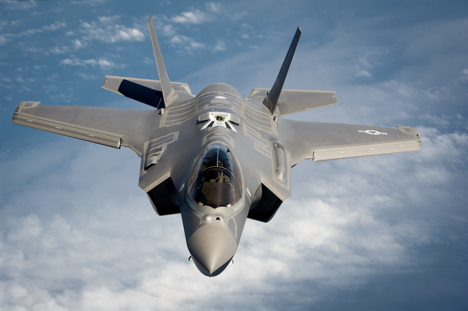 U.S. Air Force F-35A Lightning II Joint Strike Fighter instructor pilots from the 58th Fighter Squadron, 33rd Fighter Wing, Eglin AFB, Fla. navigate their aircraft toward an Air Force Reserve KC-135 Stratotanker from the 336th Air Refueling Squadron, March ARB, Calif., May 16, 2013 off the coast of Northwest Florida. The 33rd Fighter Wing is a joint graduate flying and maintenance training wing that trains Air Force, Marine, Navy and international partner operators and maintainers of the F-35 Lightning II. (U.S. Air Force photo by Master Sgt. John R. Nimmo, Sr./RELEASED) DIGITAL